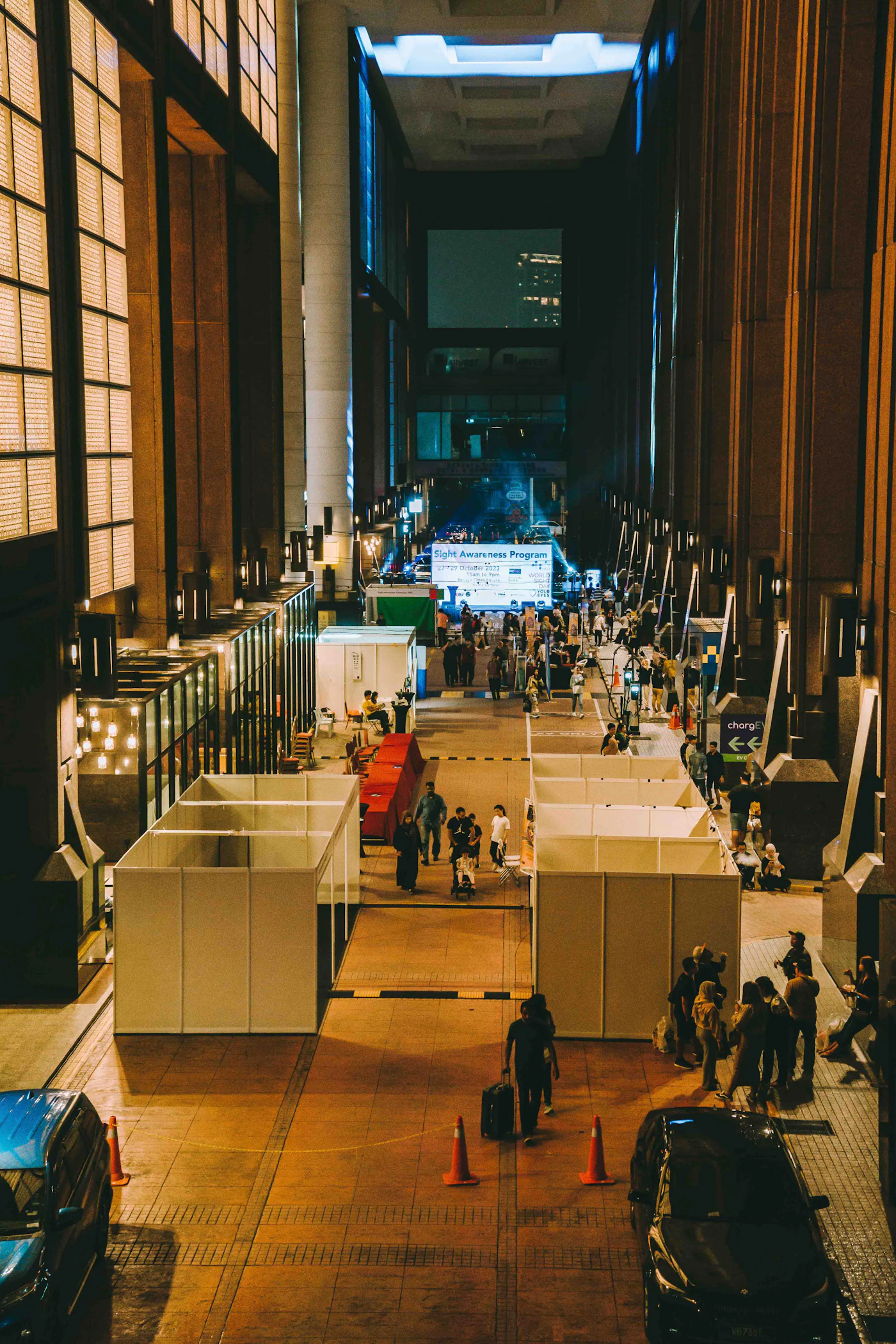 Aisle of exhibition booths in a large hall